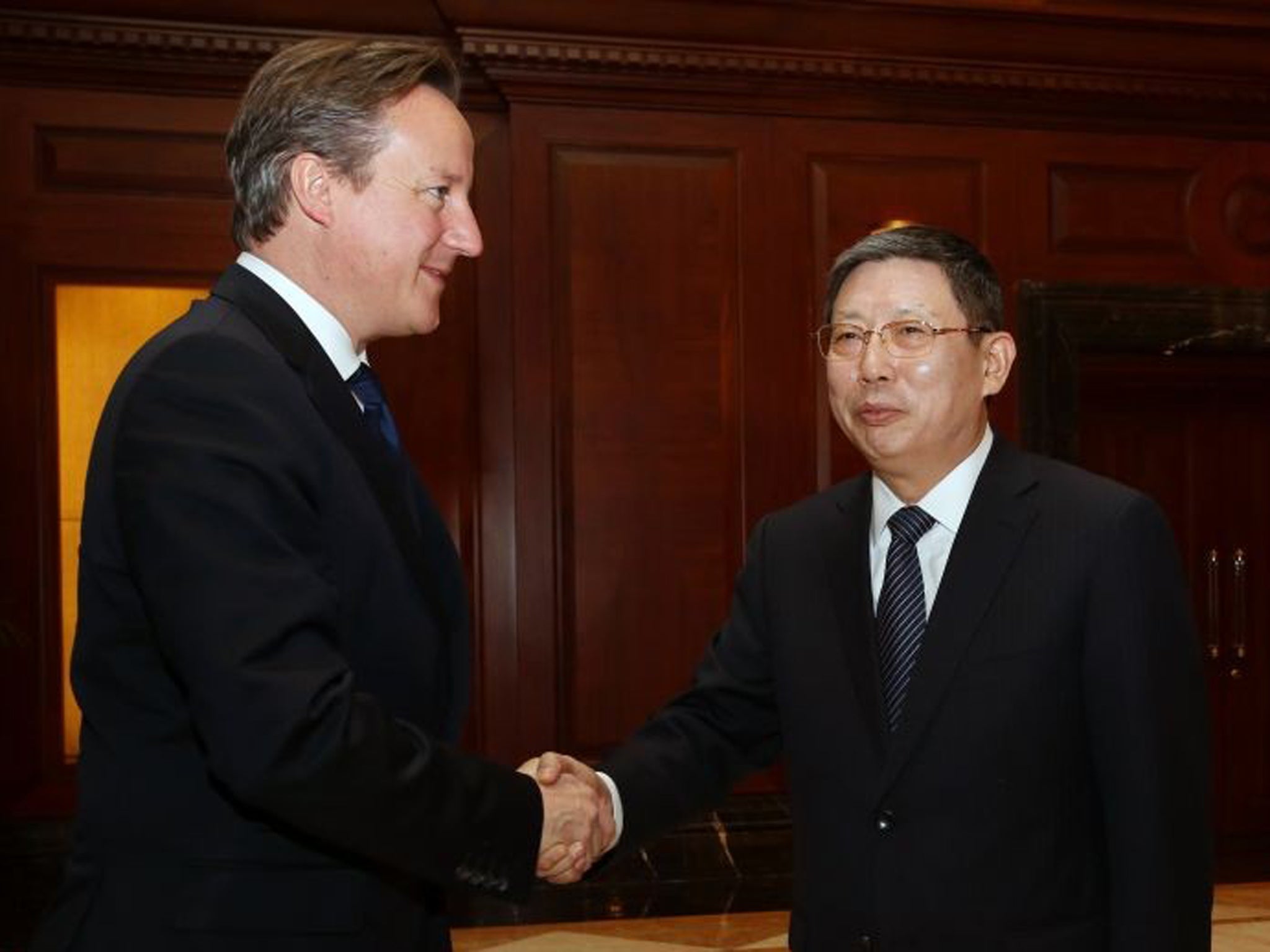 Shanghai Mayor Yang Xiong greets David Cameron