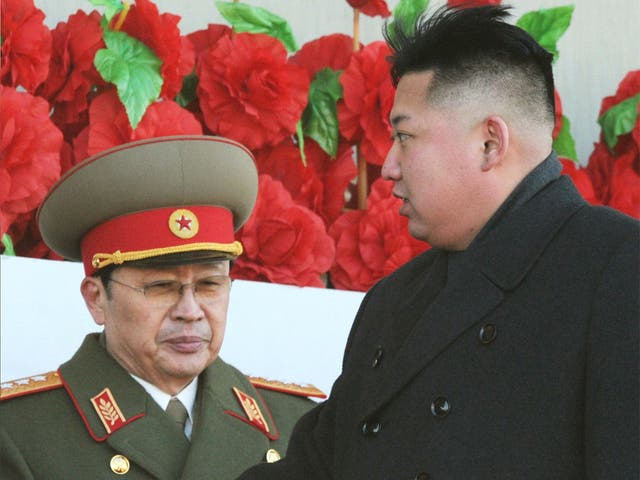 North Korean leader Kim Jong Un (right) pictured with his uncle, Jang Song Thaek, earlier this year