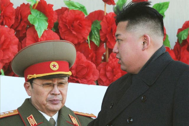 North Korean leader Kim Jong Un (right) pictured with his uncle, Jang Song Thaek, earlier this year
