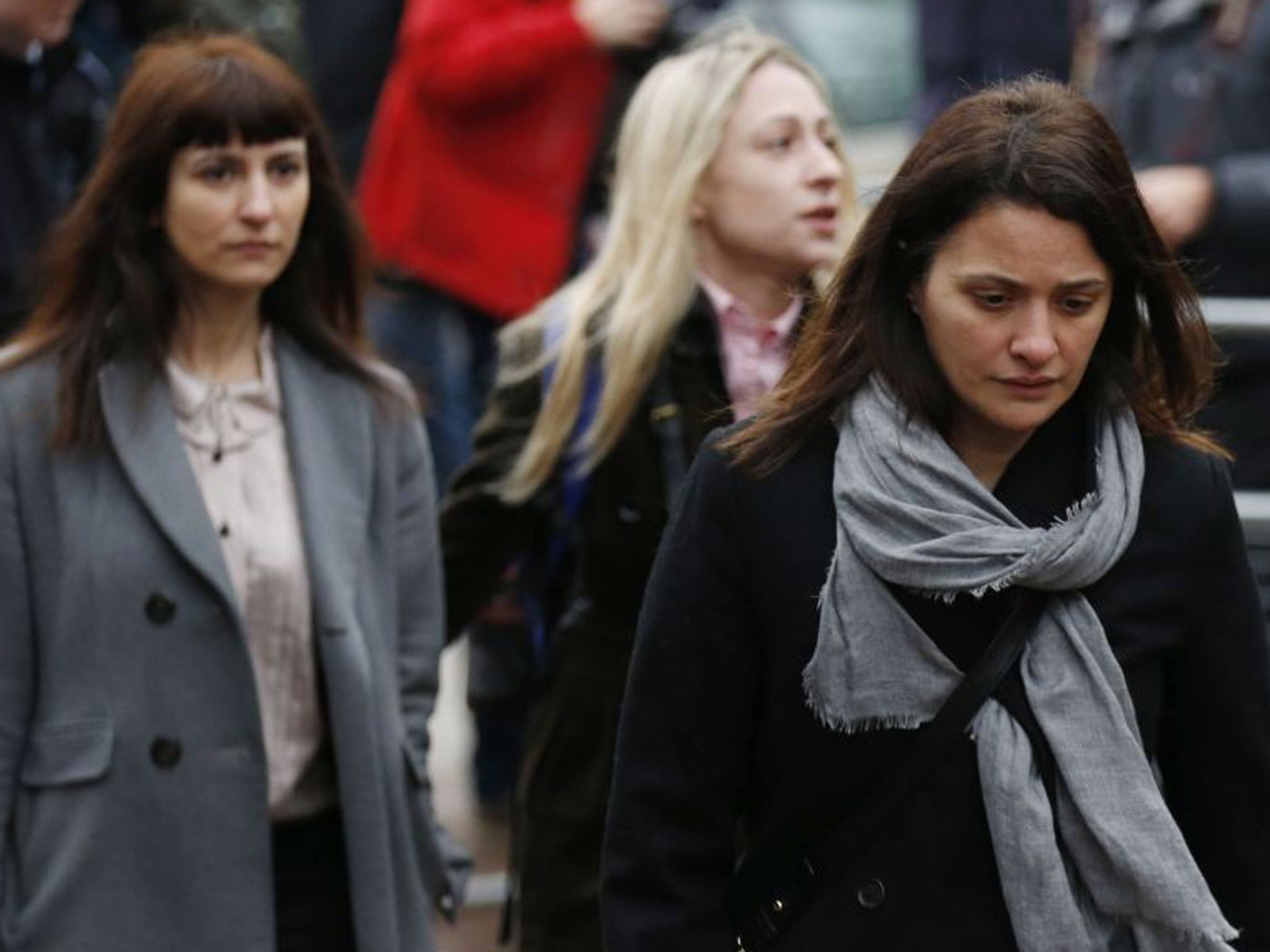 Elisabetta Grillo, foreground, and Francesca Grillo, left, deny abusing their positions by using credit cards loaned to them by Ms Lawson and her former husband Charles Saatchi