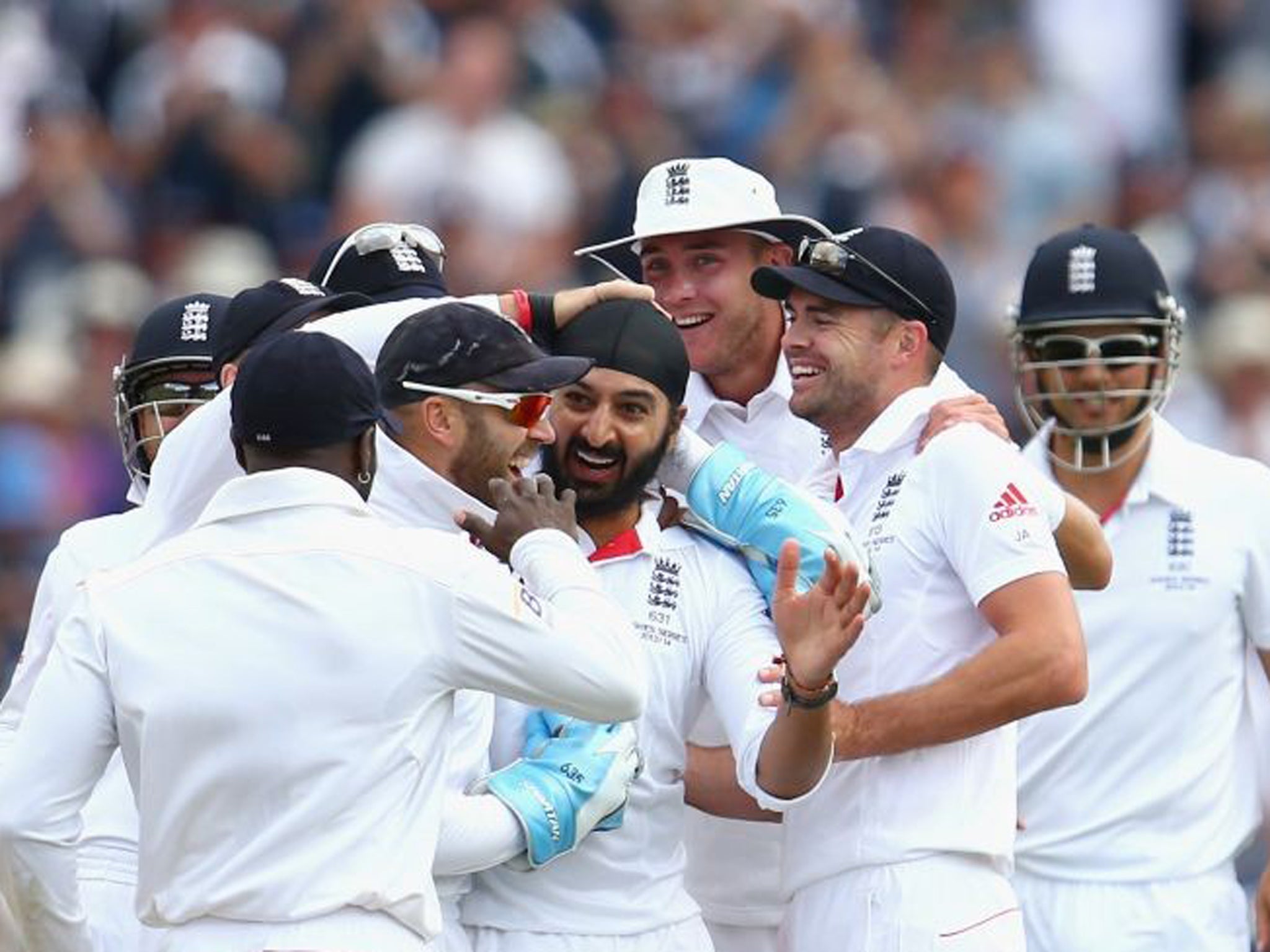 Monty Panesar celebrates after taking the wicket of Steve Smith