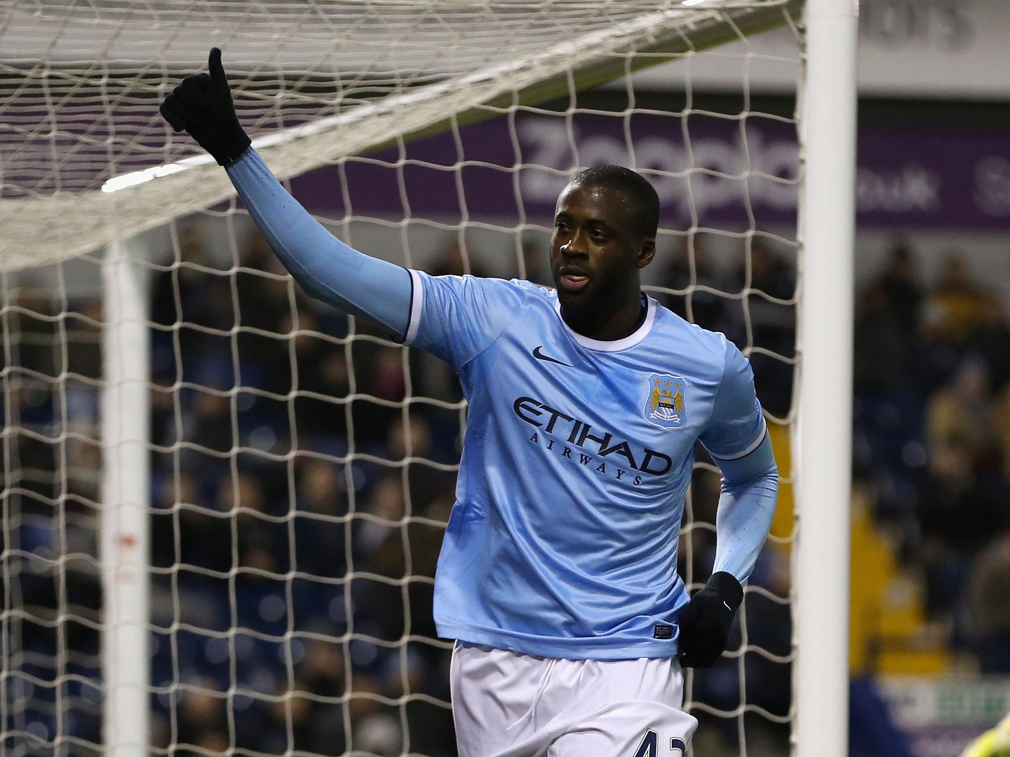 Manchester City midfielder Yaya Toure celebrates after scoring in the 3-2 win over West Brom