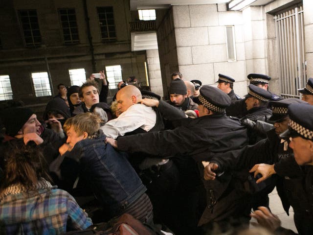 Police clash with students in London at the gates of Senate House