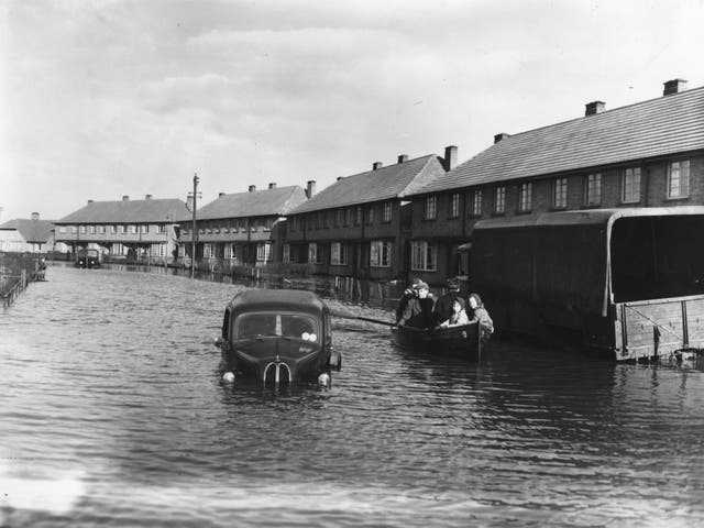 Residents of Canvey Island, Essex, being rescued by boat, during the disastrous floods,1953