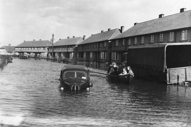 Residents of Canvey Island, Essex, being rescued by boat, during the disastrous floods,1953