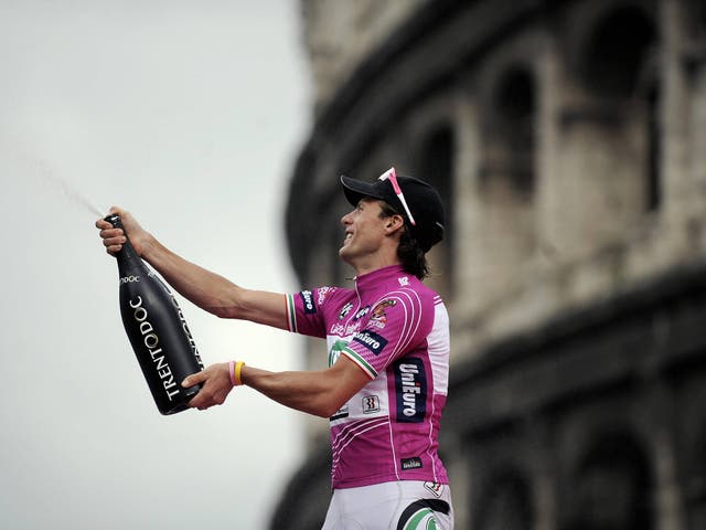 Danilo Di Luca pictured celebrating a Giro d'Italia stage victory in 2009