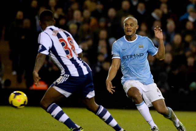 Vincent Kompany in action against West Brom