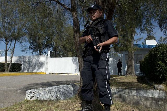 Officers stand guard outside Mexico's National Institute for Nuclear Research