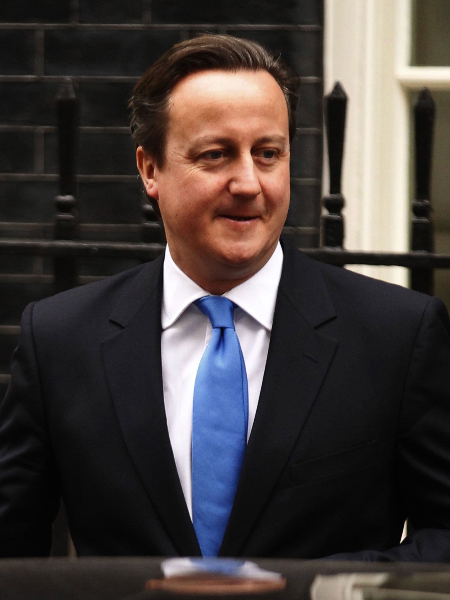 David Cameron has delayed a vote on the removal next month of border controls on Romanians and Bulgarians