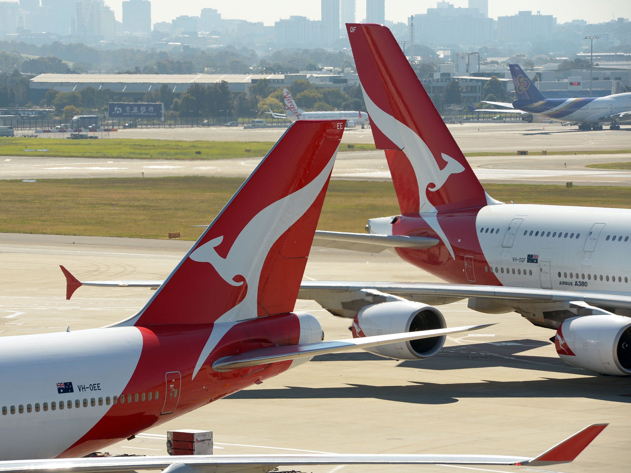 Qantas' business class costs £4,200 from NSW to Texas (AFP/Getty)