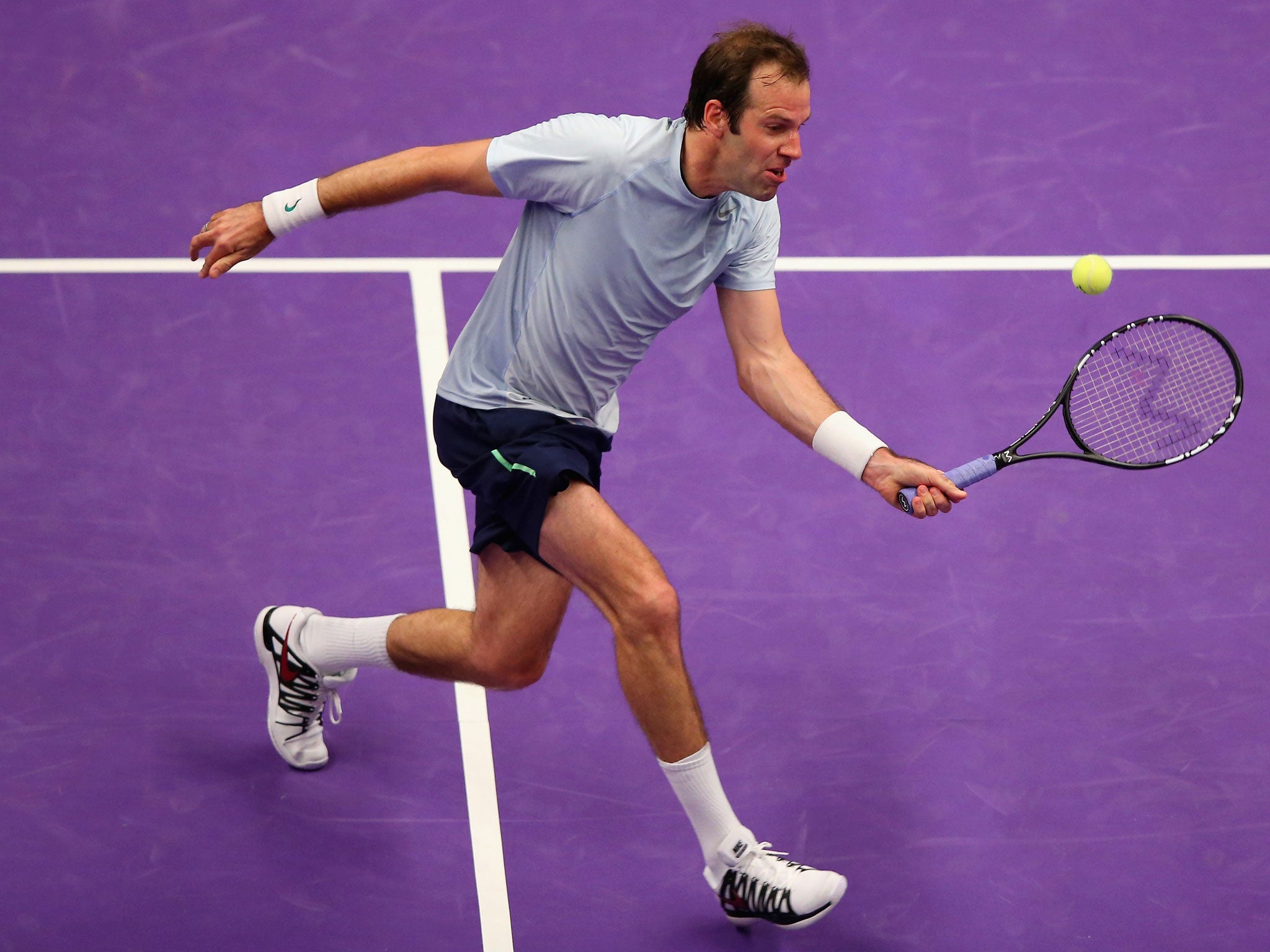 Greg Rusedski plays a forehand during his match against Pat Rafter at the Royal Albert Hall