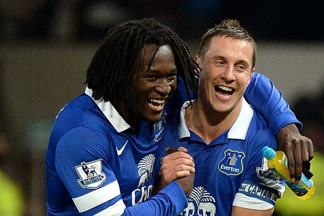 Phil Jagielka (right) celebrates victory at Old Trafford with Romelu Lukaku