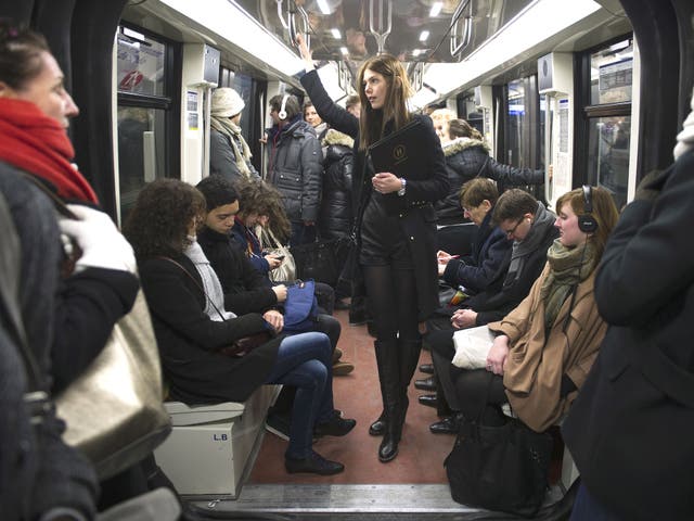 Commuters inside the metro in Paris