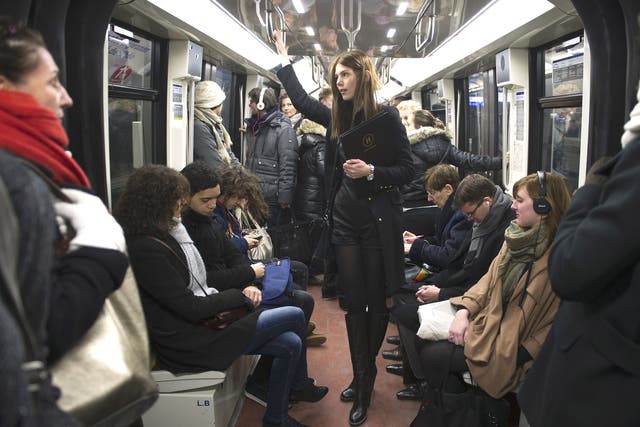 Commuters inside the metro in Paris