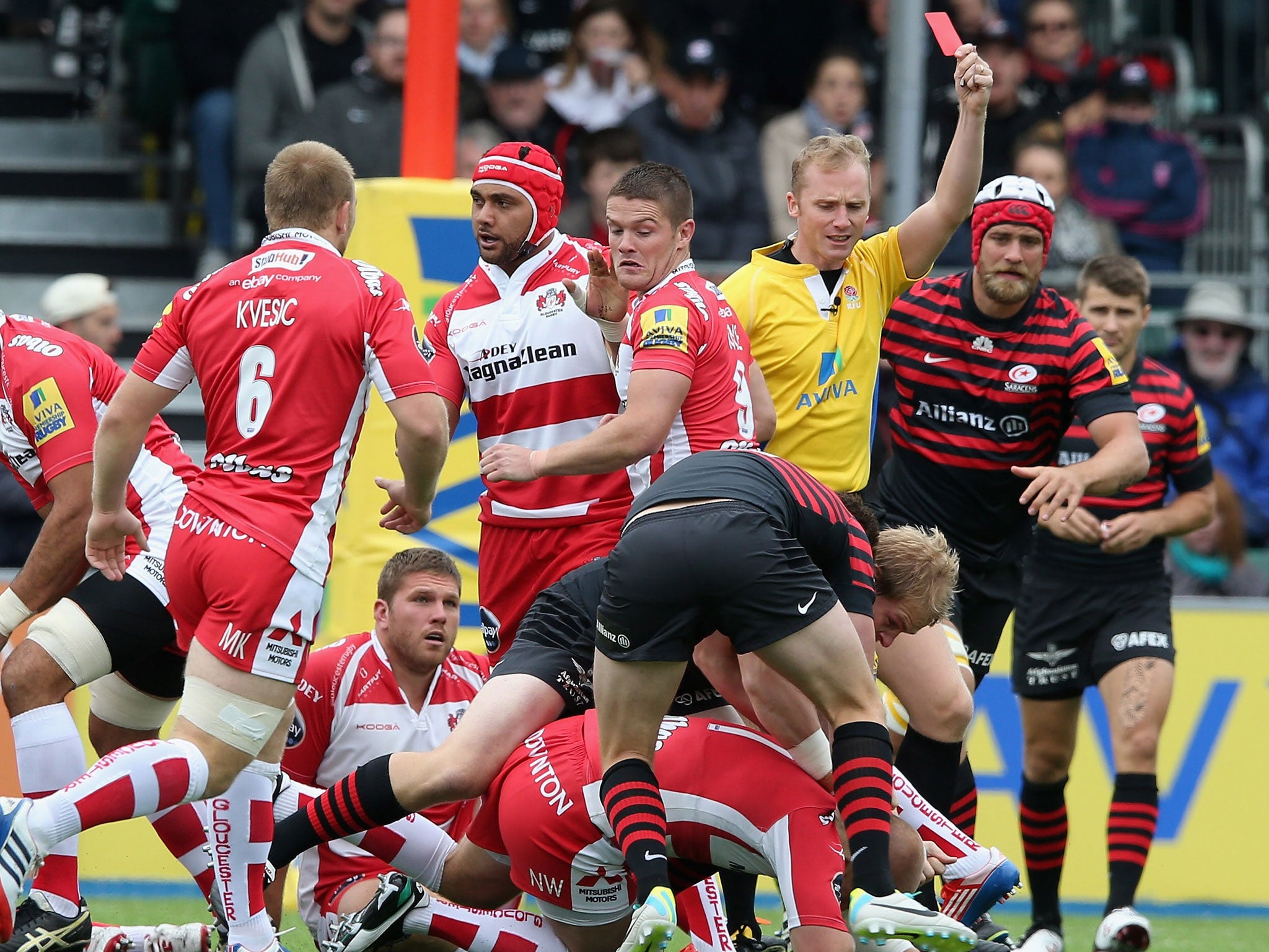 Gloucester's Nick Wood is shown a red card by referee Wayne Barnes during the Premiership game against Saracens