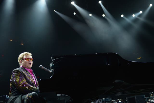 Elton John performing in New York - he interrupted a performance in Moscow to condemn Russia's anti-gay laws as inhumane