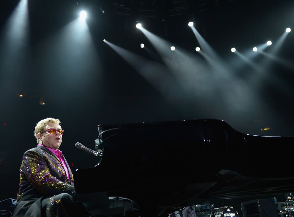 Elton John performing in New York - he interrupted a performance in Moscow to condemn Russia's anti-gay laws as inhumane