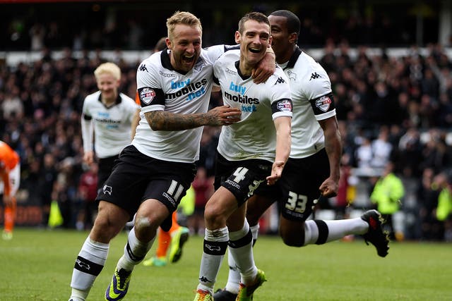 Derby County celebrate after Chris Bryson scores