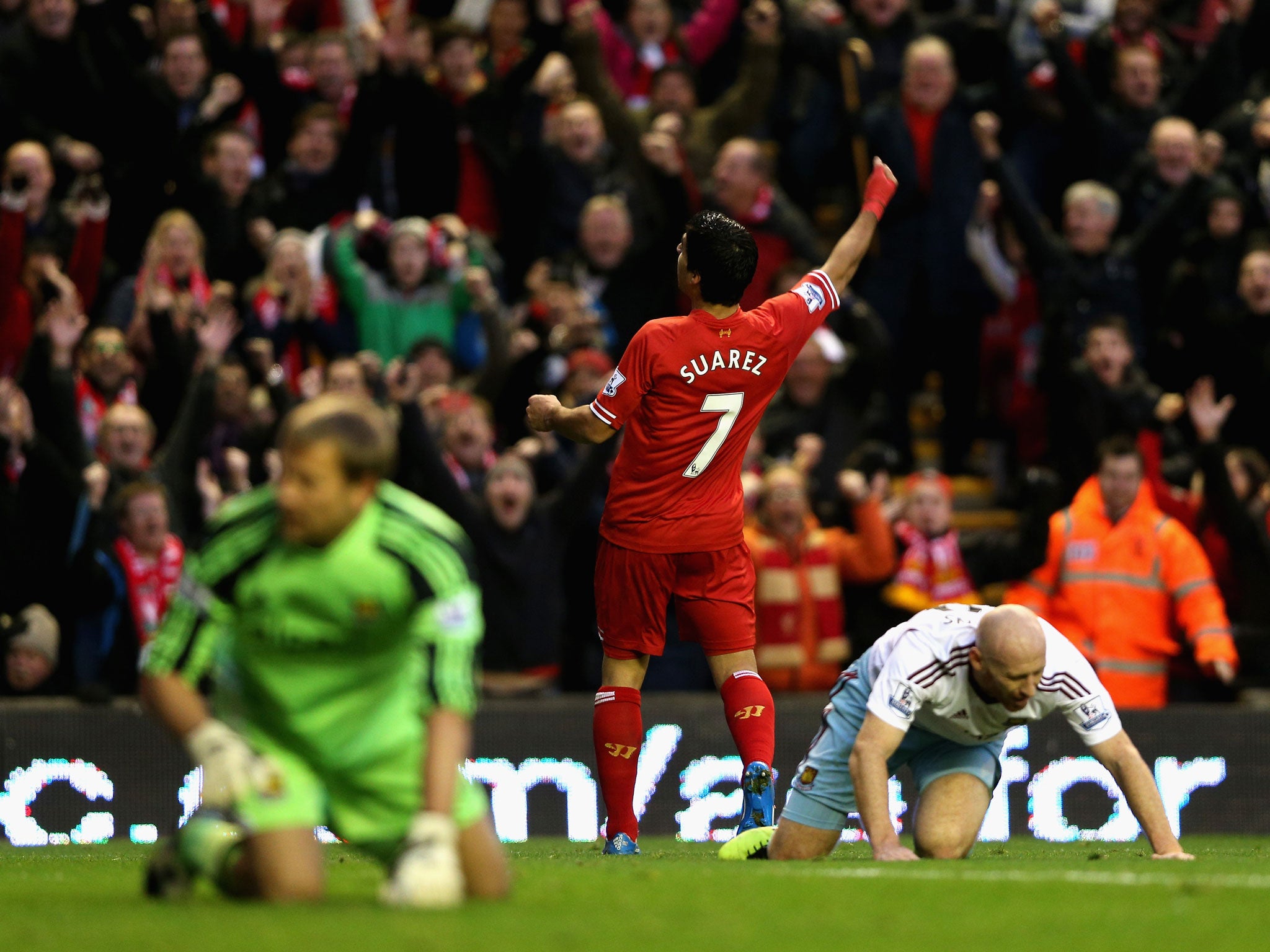 Luis Suarez of Liverpool celebrates during the game with West Ham
