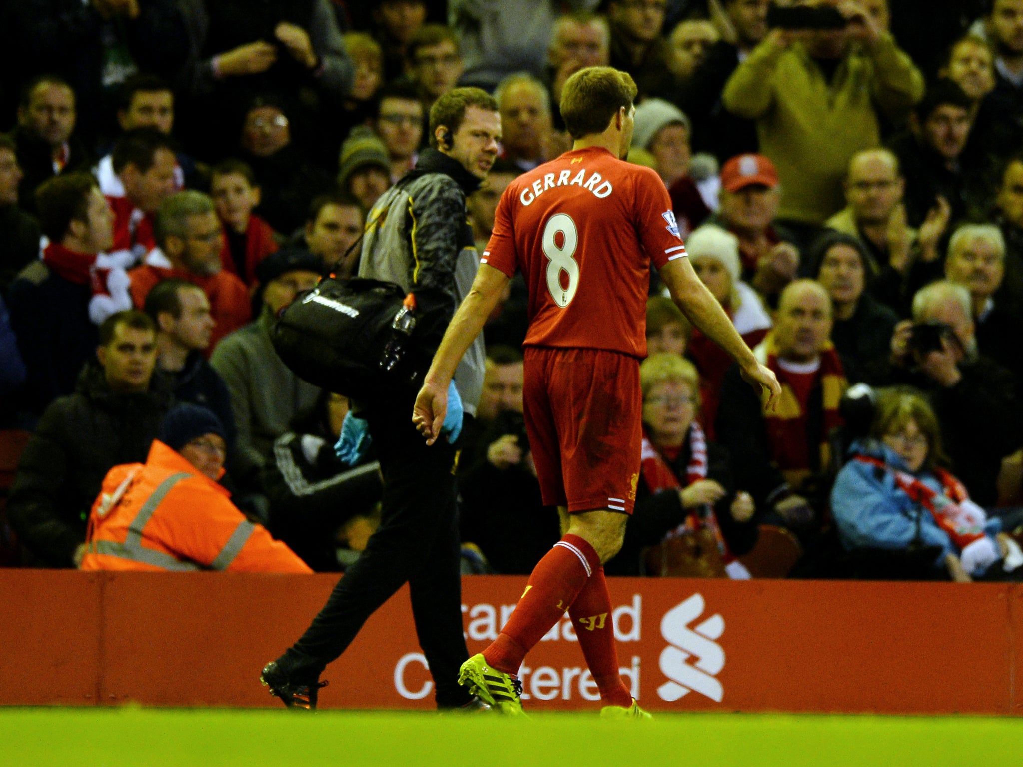Liverpool captain Steven Gerrard limps off during the 4-1 victory over West Ham