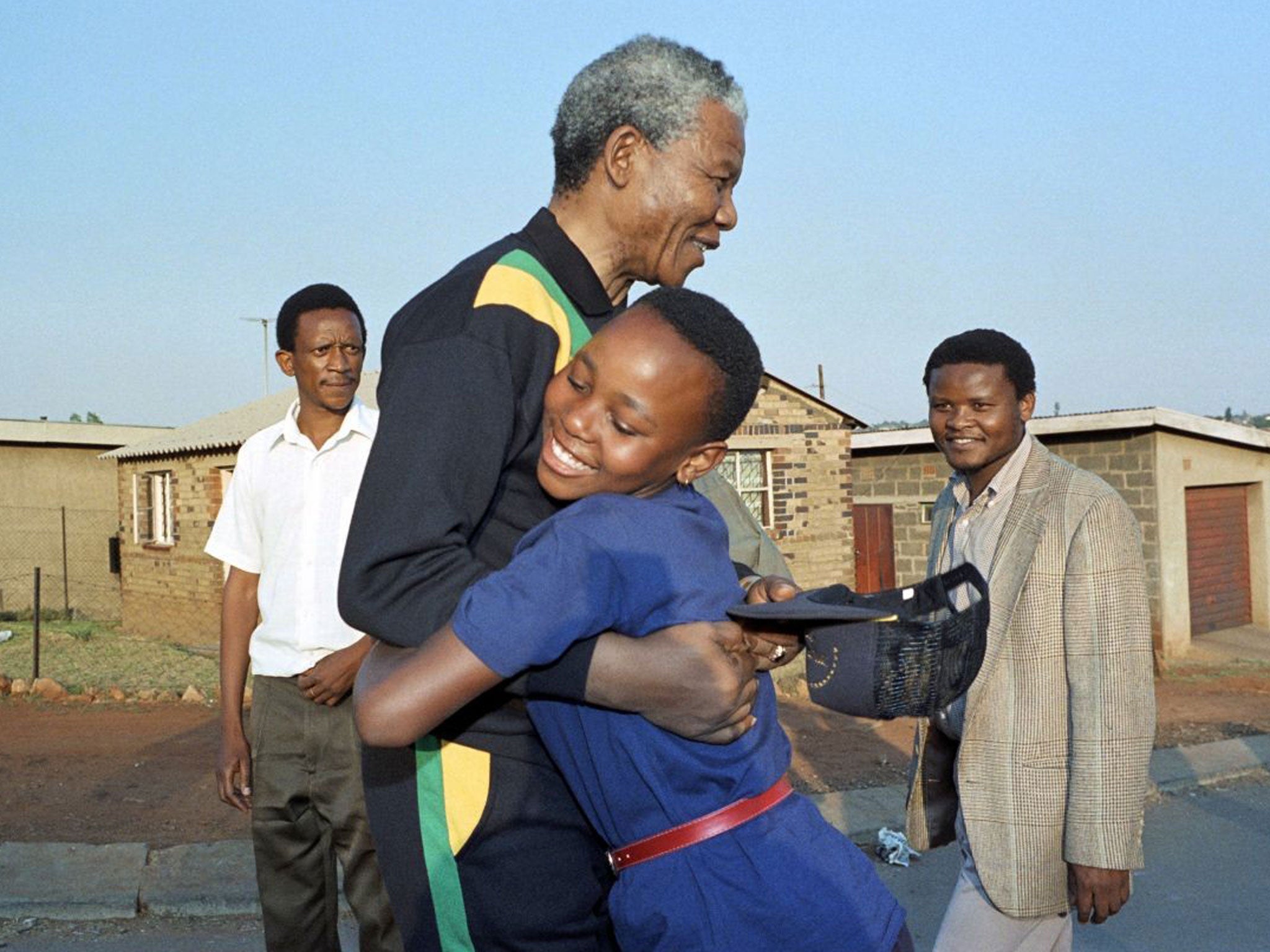 Common touch : Nelson Mandela, here in Soweto in 1990, wore his ‘exalted resonance’ with ease