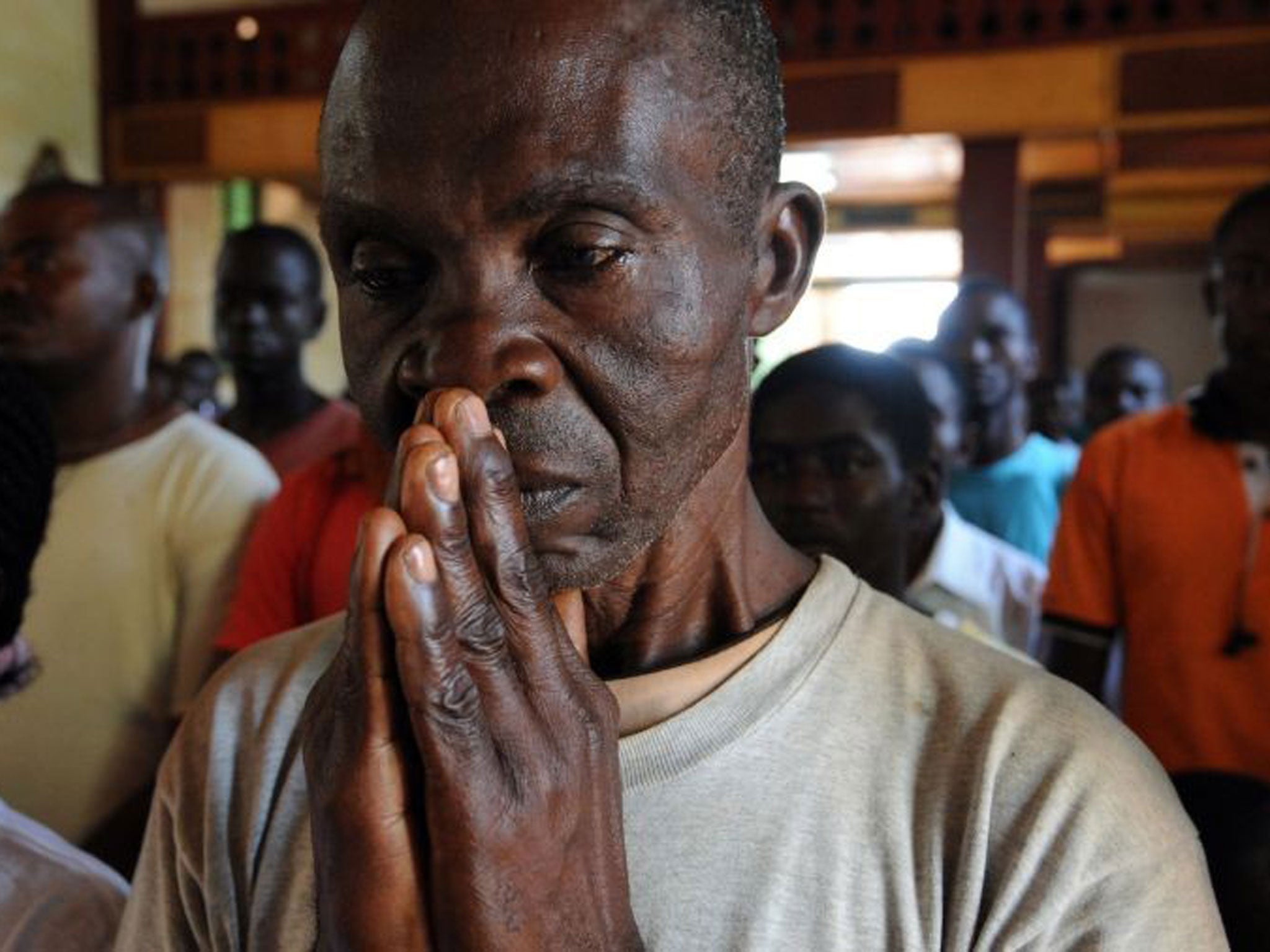 A man prays in St Paul’s Cathedral, Bangui yesterday