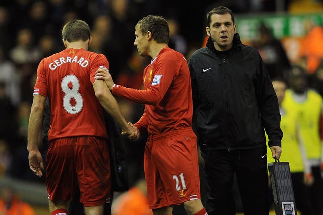Lucas Leiva (right) comes on for Steven Gerrard on Saturday
