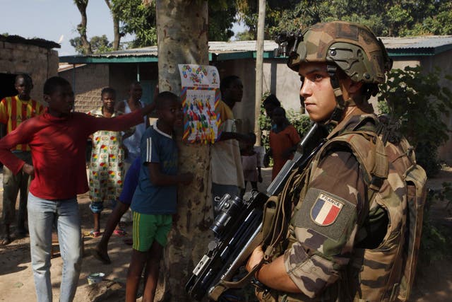 A French soldier patrols the streets of Bangui in the Central African Republic 