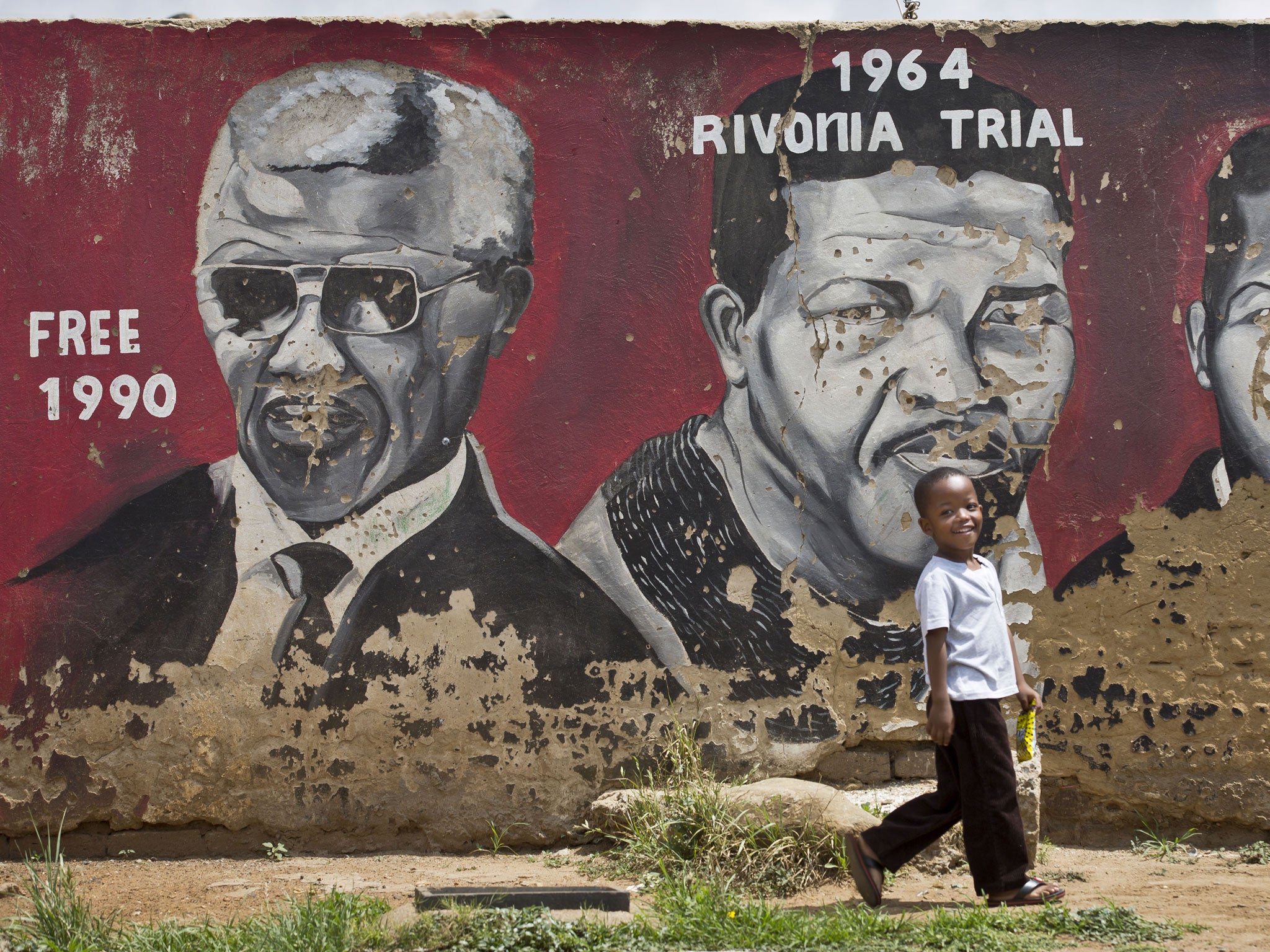 A mural depicting Nelson Mandela in Soweto. Many claim the township has been turned into a tourist site