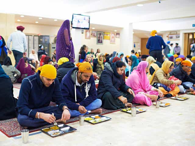 Free vegetarian food is served at the Sikh temple in Ilford, Essex
