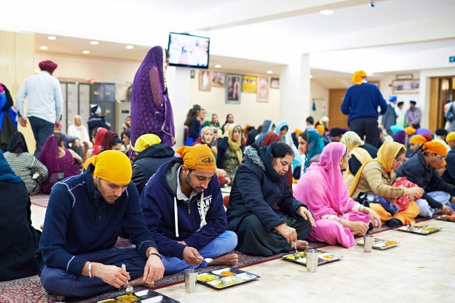 Free vegetarian food is served at the Sikh temple in Ilford, Essex