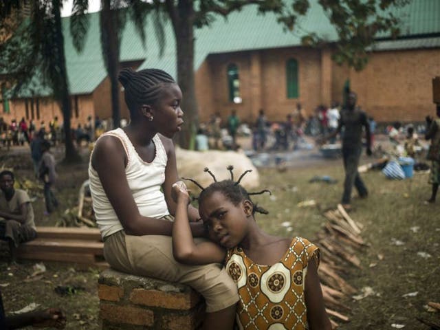 People gather to escape violence in the center of Bangui, in the garden of the Archbishop of Bangui at Saint-Paul's parish, Central African Republic