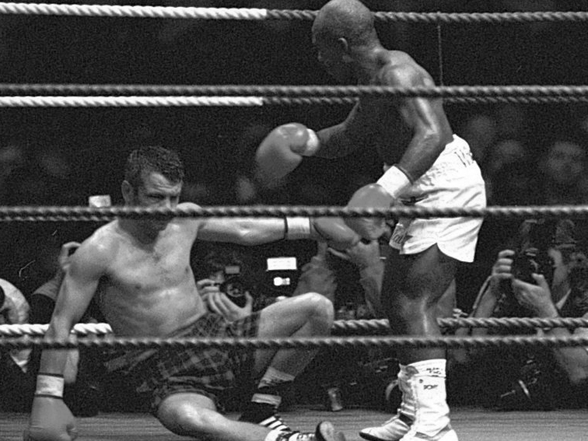 Matlala, right, on his way to victory against Pat Clinton in Glasgow in 1993