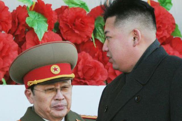 North Korean leader Kim Jong Un and his uncle, Jang Song Thaek