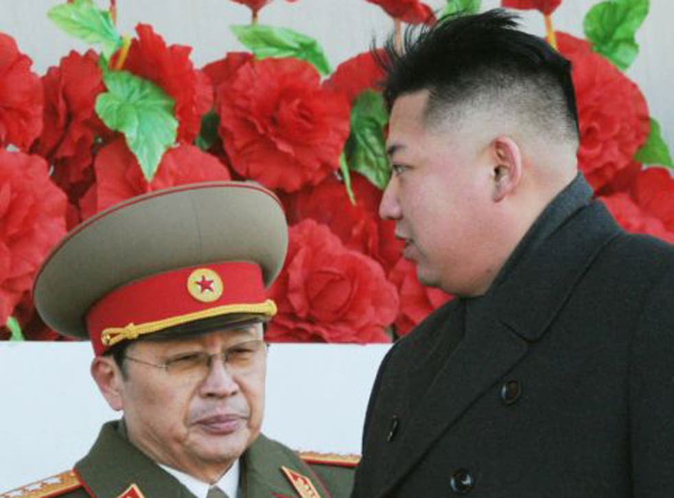 North Korean leader Kim Jong Un and his uncle, Jang Song Thaek