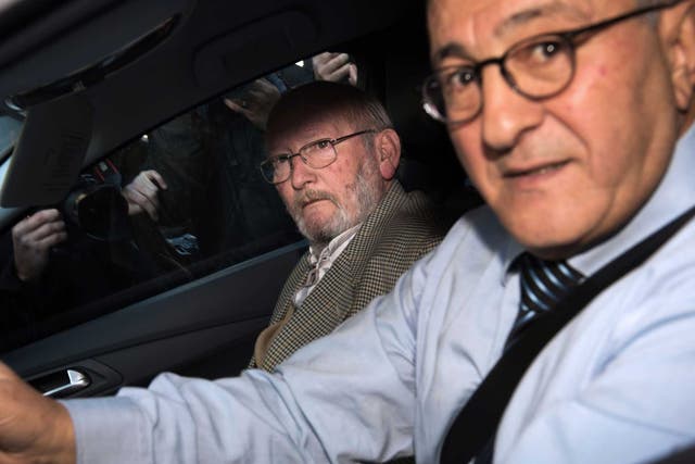 Poly Implant Prothese (PIP) founder Jean-Claude Mas (left) leaves the courthouse with his French lawyer Yves Haddad
