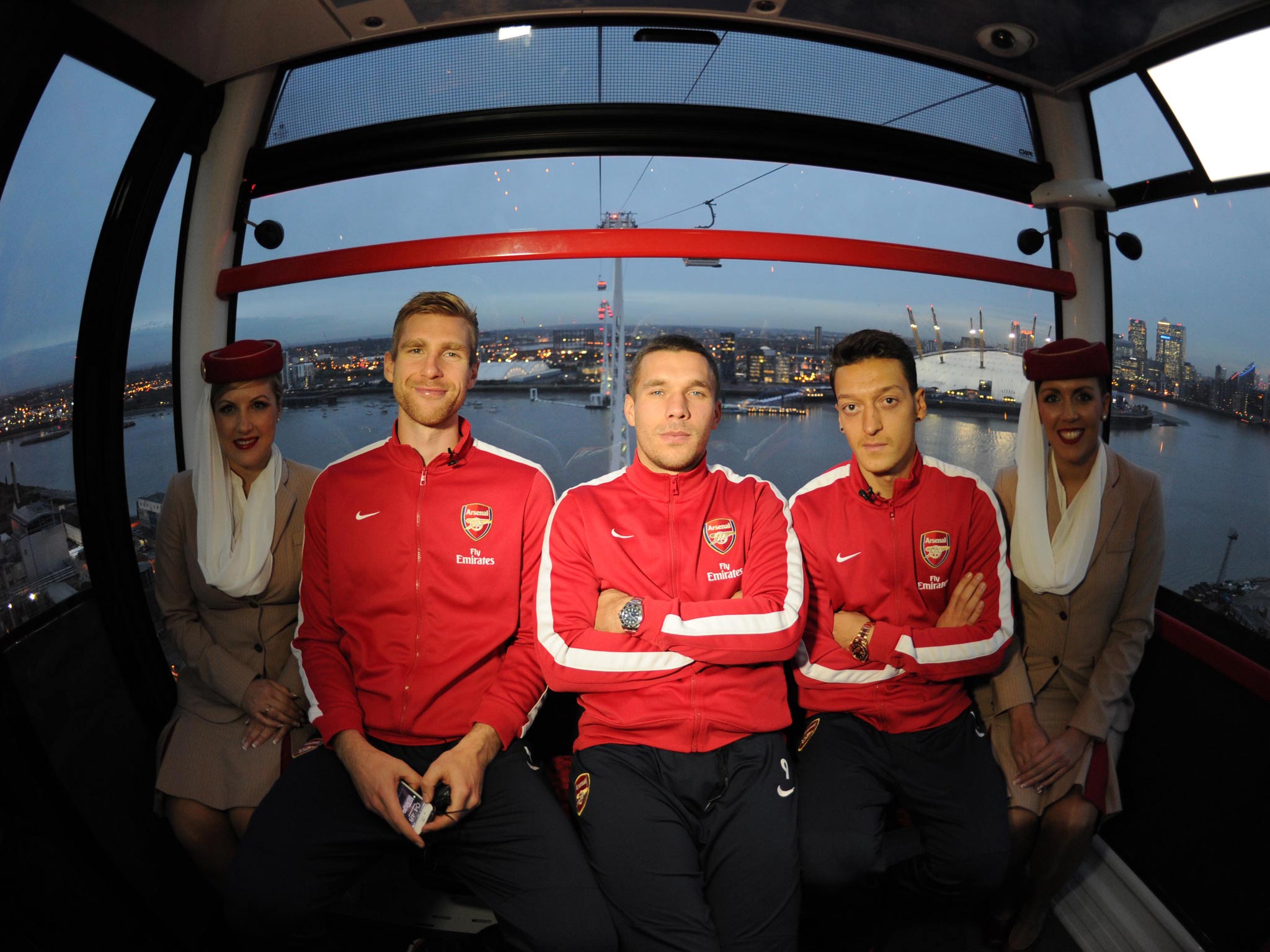 Mesut Ozil, Per Mertesacker and Lukas Podolski take a ride on the Emirates Airline