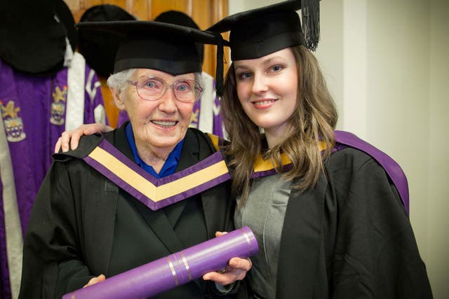 Gene Hetherington (left) and her granddaughter Rachel collect their degrees from the University at Manchester