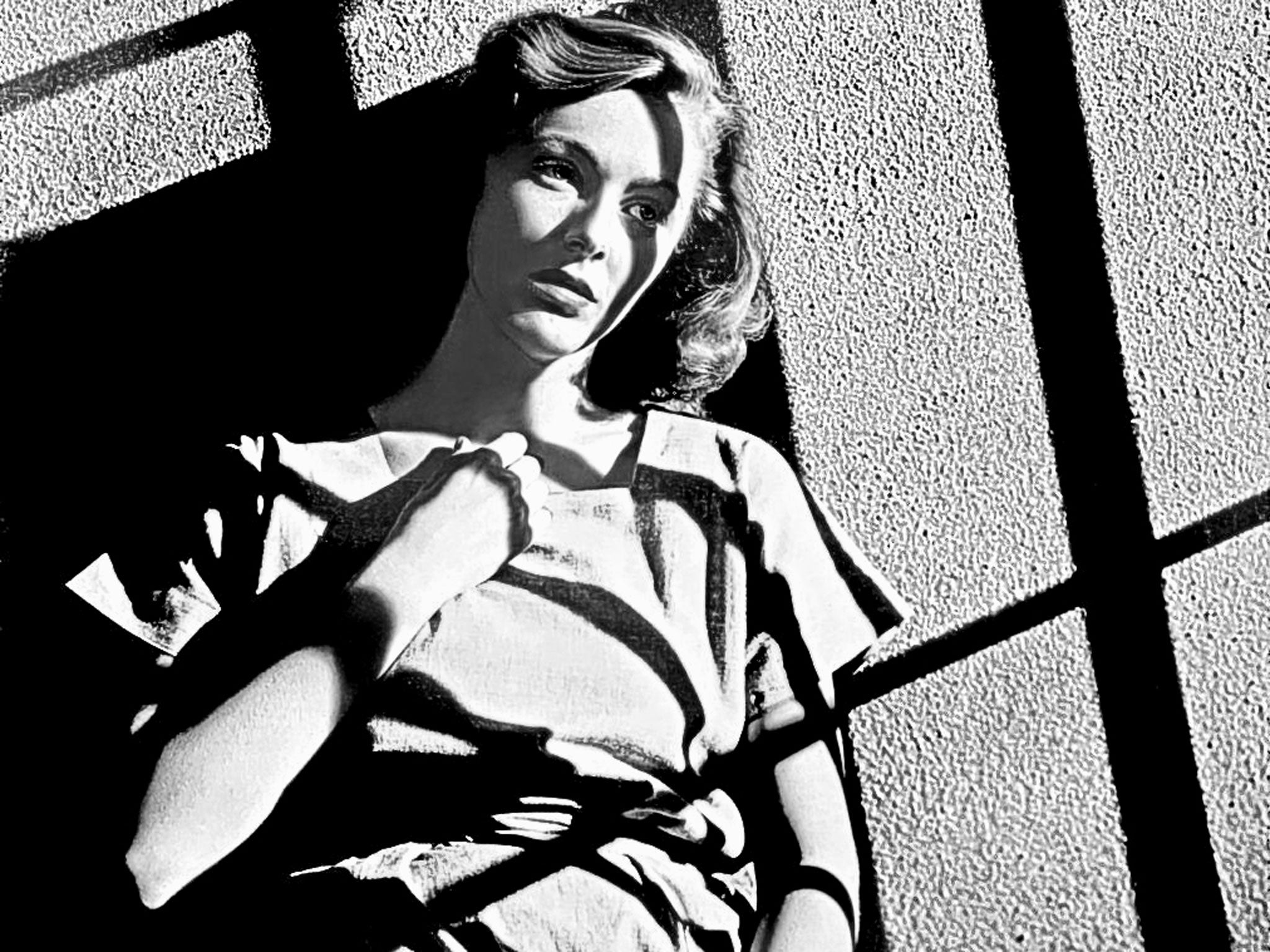 Parker in 'Caged', in which she plays a woman who becomes
hardened to prison life; the role won her her first Oscar nomination