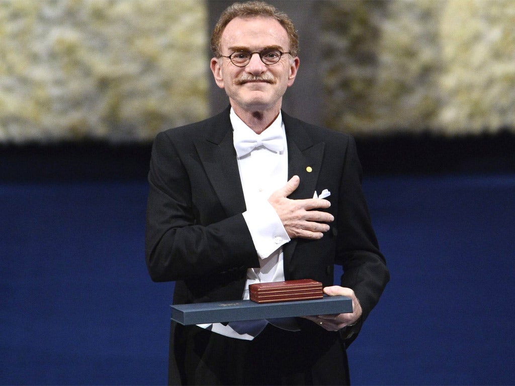 The Nobel Prize in Physiology or Medicine 2013 Randy W Schekman poses with his medal