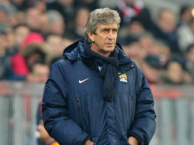 Manuel Pellegrini looks on from the touchline at the Allianz Arena