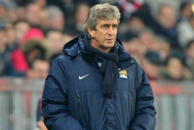 Manuel Pellegrini looks on from the touchline at the Allianz Arena