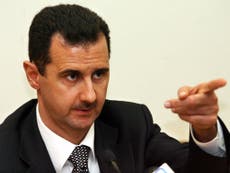 Assad says US-led coalition shares info about air strikes