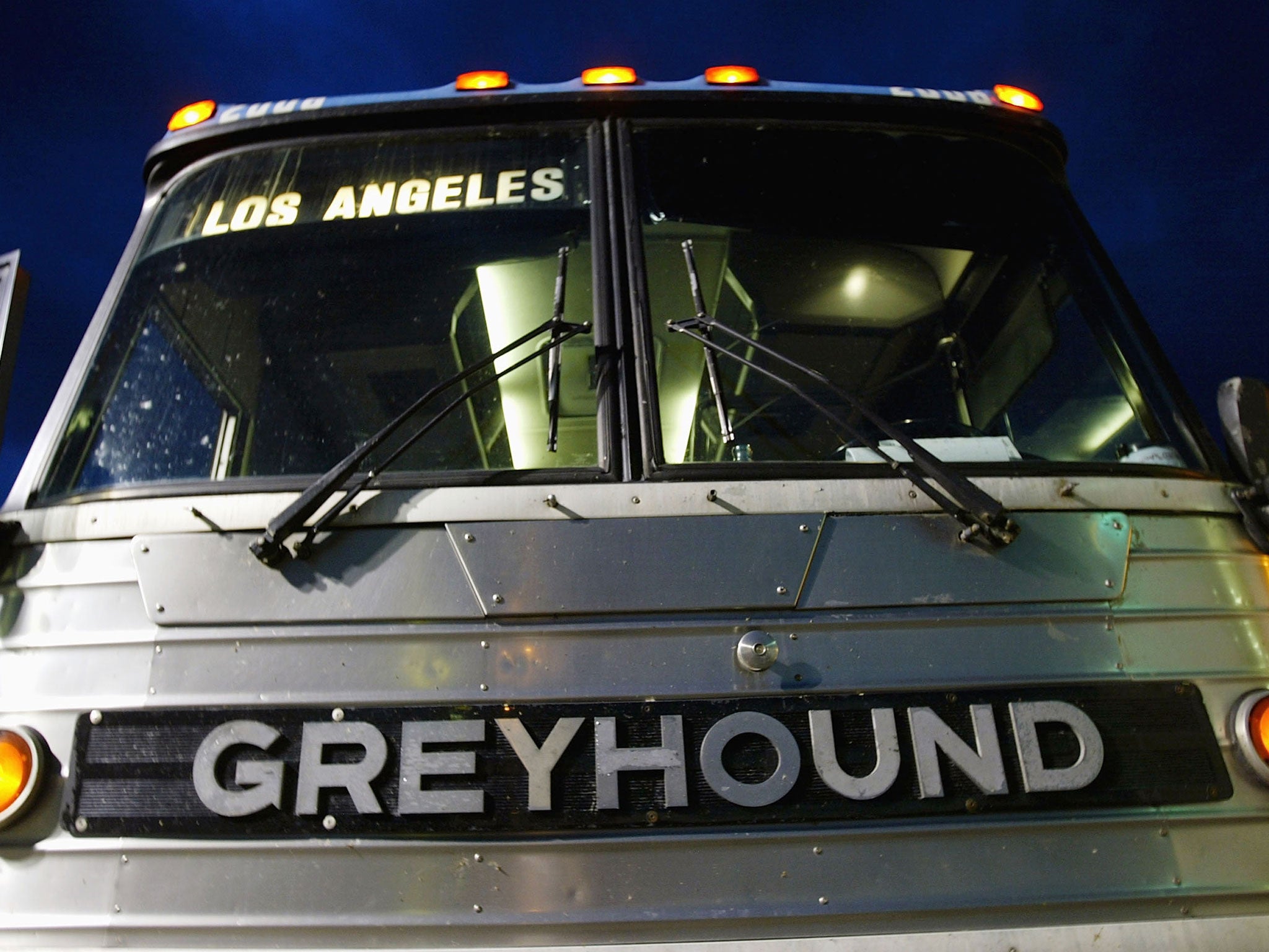 FirstGroup has rejected pressure from a US investor to sell-off its North American bus business, Greyhound, in a bid to boost shareholder value.