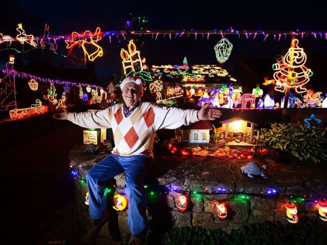 Eric Marshalls (73) outside his home in Bagby, Noth Yorkshire. Eric spends up to three weeks erecting his display of Christmas lights which he has amassed over 20 years