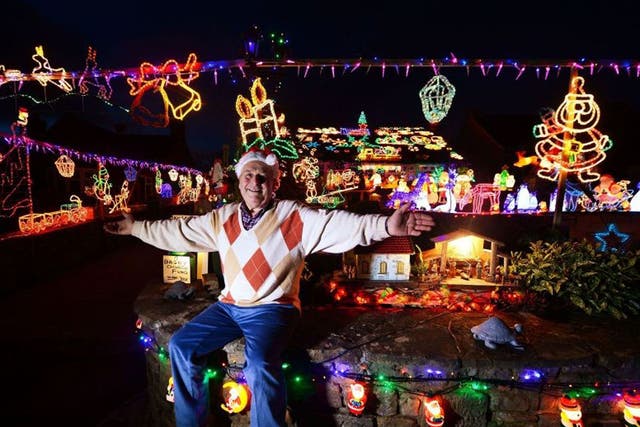 Eric Marshalls (73) outside his home in Bagby, Noth Yorkshire. Eric spends up to three weeks erecting his display of Christmas lights which he has amassed over 20 years