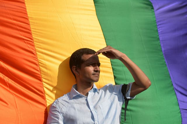 An Indian gay-rights activist looks on during a protest against the Supreme Court ruling reinstating a ban on gay sex