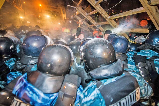 Thousands of riot police were forced to withdraw