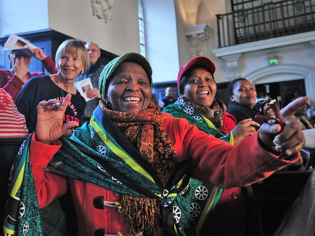 Women dance in the pews at St Martin-in-the-Fields church