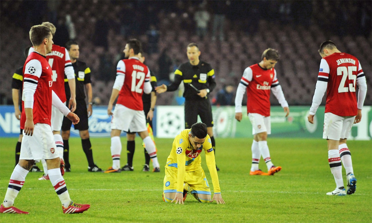 Jose Maria Callejon sinks to his knees as Napoli are eliminated from the Champions League